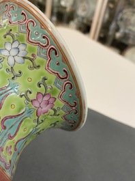 A Chinese famille rose lime-green-ground vase, Qianlong mark, 19/20th C.
